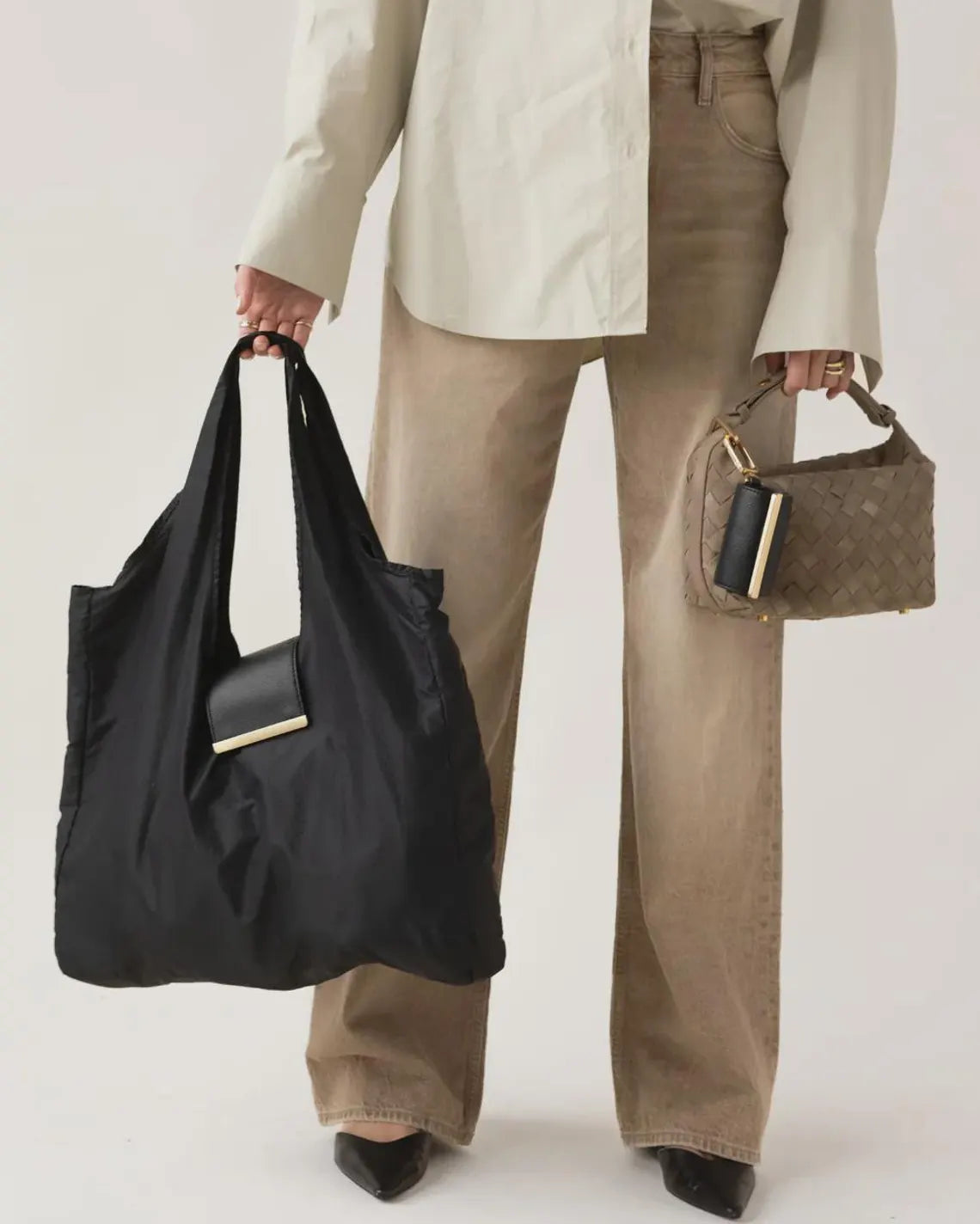 TinyTote folded into a compact keychain pouch